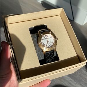 Beautiful gold watch with crystal details